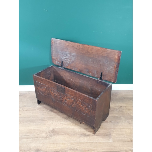 13 - A 17th Century oak Six plank Chest with carved arched and floral designs, 1ft 8