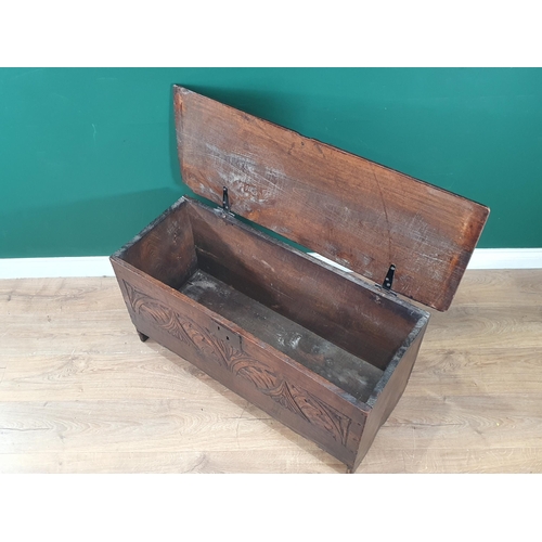 13 - A 17th Century oak Six plank Chest with carved arched and floral designs, 1ft 8