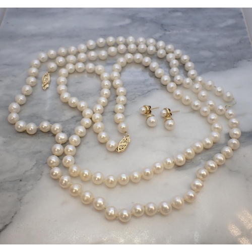 169 - Two single rows of Cultured Pearls on clasps stamped 14K and a pair of Cultured Pearl drop Earrings ... 