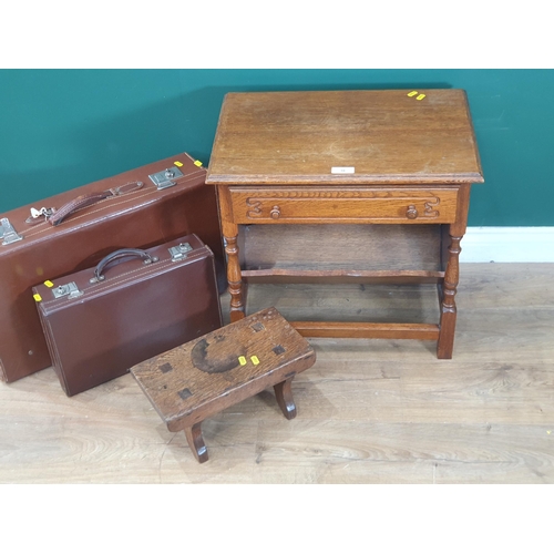 18 - An oak Side Table/Magazine Rack, an oak Stool, two Luggage Cases and a gilt framed Wall Mirror. (R2)... 