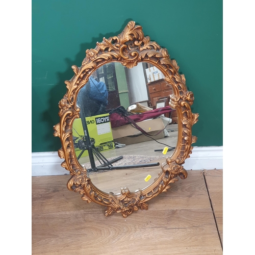 18 - An oak Side Table/Magazine Rack, an oak Stool, two Luggage Cases and a gilt framed Wall Mirror. (R2)... 