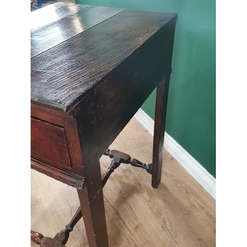 19 - A 17th Century oak Side Table with single fitted end drawer, on turned supports and stretcher, 2ft 1... 