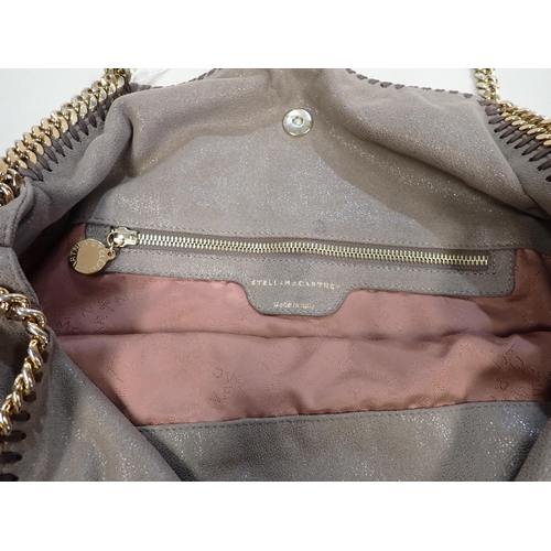 191 - A Stella McCartney taupe faux suede shoulder Bag with heavy gilt metal strap