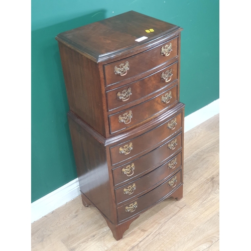 20 - A reproduction mahogany seven drawer Tallboy on bracket feet, 3ft 1