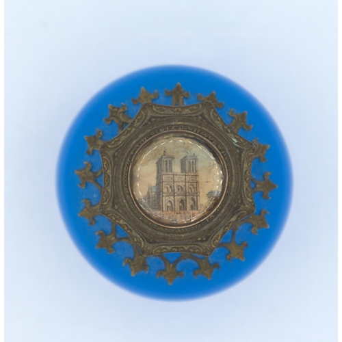 200 - A blue glass Grand Tour Scent Bottle with gilt metal mounts, depicting cathedral to lid, 4in