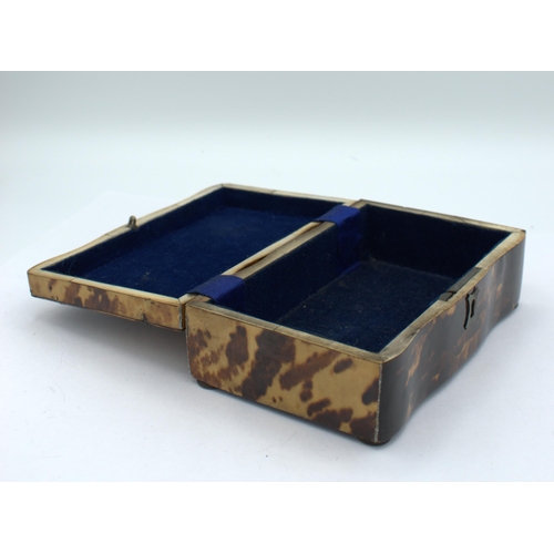 202 - A tortoiseshell Jewel Box with mother of pearl cartouche, 6in x 3 1/2in x 2in