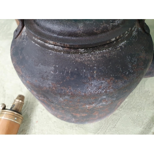 217 - A pair of Vases made from shell cases, a cast iron Kettle stamped Swain, a copper Shot Flask and a p... 