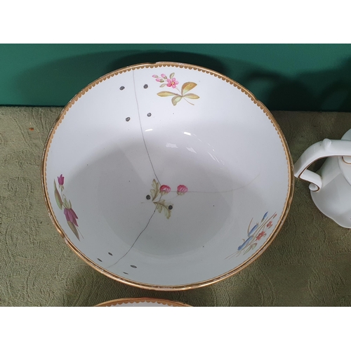 219 - A small Coalport Teapot with sprays of flowers, gilding and deep blue ground, cracks to base and spo... 