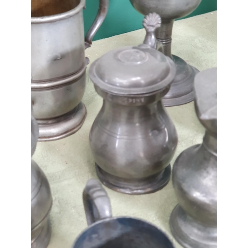 228 - A quantity of pewter including pedestal Mugs, Goblet, Tankards, Inkwell, Salt, Bell, etc, (R7)