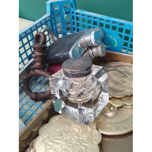 243 - Two plastic Trays containing various brasses, two Hip Flasks, an Inkwell, Plates and Mugs etc