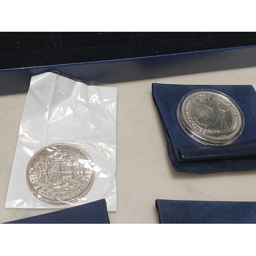 271 - A Westminster box of Collector’s Coins to include a US Morgan Dollar 1890, 
two 1oz Britannia Coins ... 