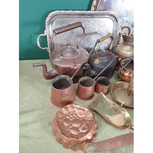 279 - A quantity of metalware including copper kettle, copper measures, a copper  egg/escargot pan, a two-... 