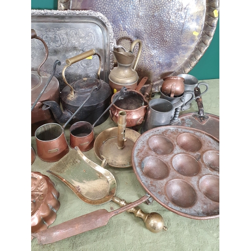 279 - A quantity of metalware including copper kettle, copper measures, a copper  egg/escargot pan, a two-... 