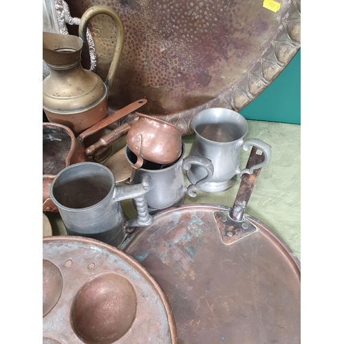 279 - A quantity of metalware including copper kettle, copper measures, a copper  egg/escargot pan, a two-... 