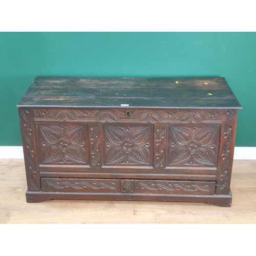 28 - A stained oak Mule Chest with carved three panel front, above single fitted drawer, 2ft 4