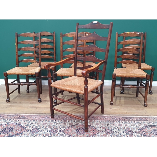 29 - A set of seven rush seated Ladderback Chairs (R3)