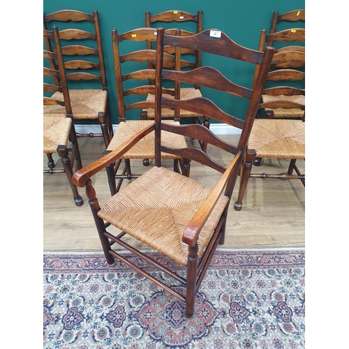 29 - A set of seven rush seated Ladderback Chairs (R3)