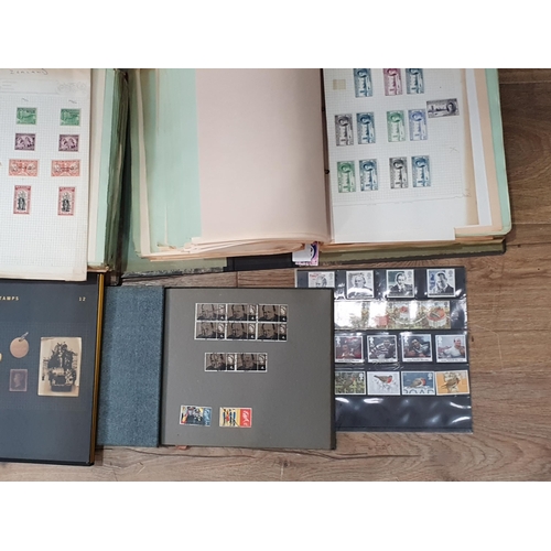 300 - A large collection of Stamps, loose and in albums, along with  a folder of First Day Covers; (qty)