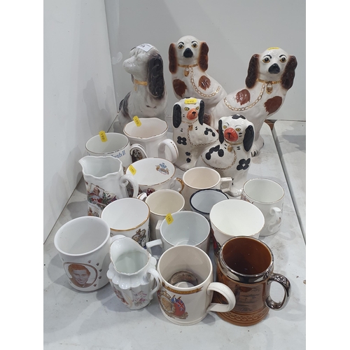 315 - Two pairs of ceramic Seated Spaniels, a Silver Napkin Ring, and a quantity of commemorative Mugs and... 