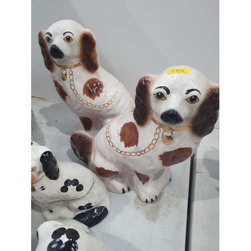 315 - Two pairs of ceramic Seated Spaniels, a Silver Napkin Ring, and a quantity of commemorative Mugs and... 