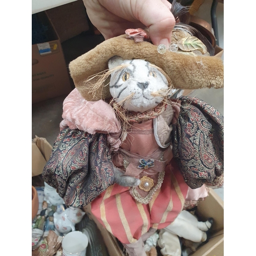 343 - A box of assorted Ceramics and Figurines and a box of Dolls. (R5).