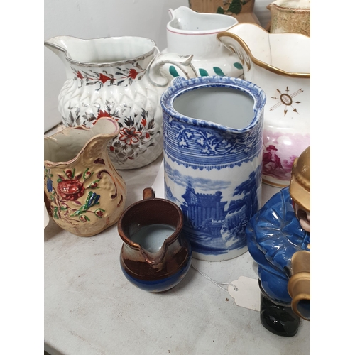 349 - A cream Royal Cauldon Jug, a Wapeheath No 3074 floral decorated Jug, a Myott & Son style Lidded Wate... 