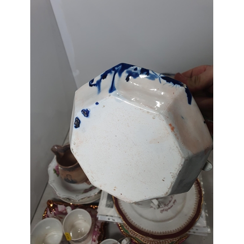 361 - A quantity of pottery and porcelain including Commemorative Mugs, an ironstone type Serpent Jug, a J... 