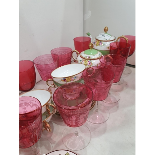 363 - A Noritake part Coffee Service, painted sprays of flowers with gilt detail, a quantity of cranberry ... 