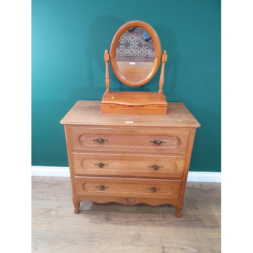 38 - A modern Chest of three drawers 2ft 9in W x 2ft 6in H and a pine Dressing Mirror (R3)