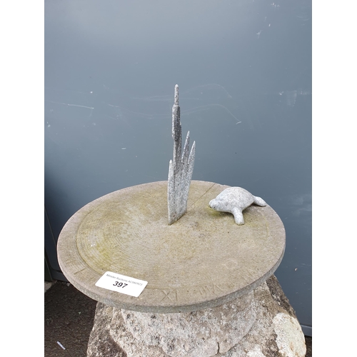 397 - A Concrete sundial with pewter turtle on top