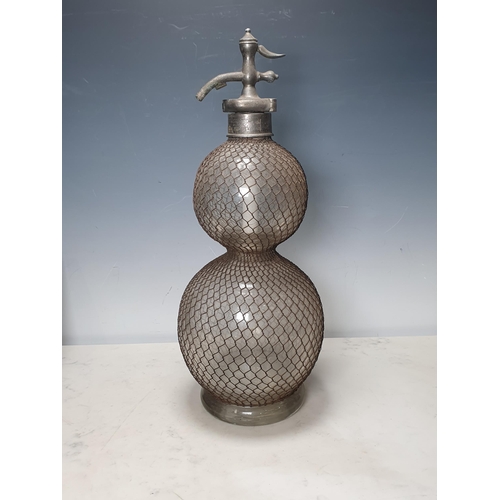 48 - A Standard English Seltzogenes double Gourd Soda Syphon with mesh cage, 19 1/2in H (R3)