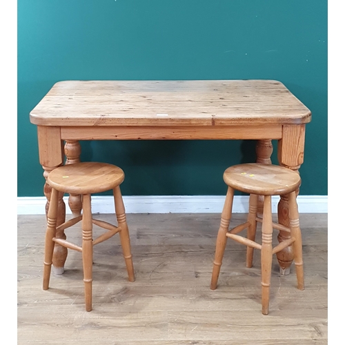 484 - A small Pine Kitchen Table on turned supports, 2ft 7