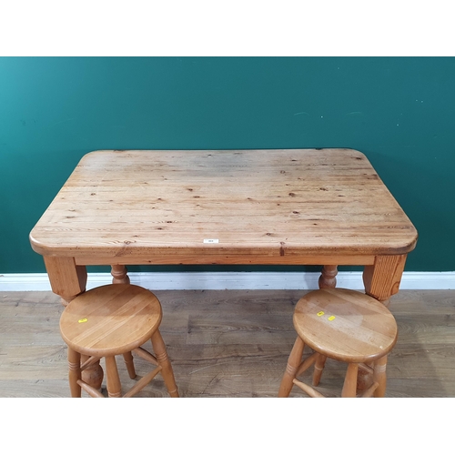 484 - A small Pine Kitchen Table on turned supports, 2ft 7