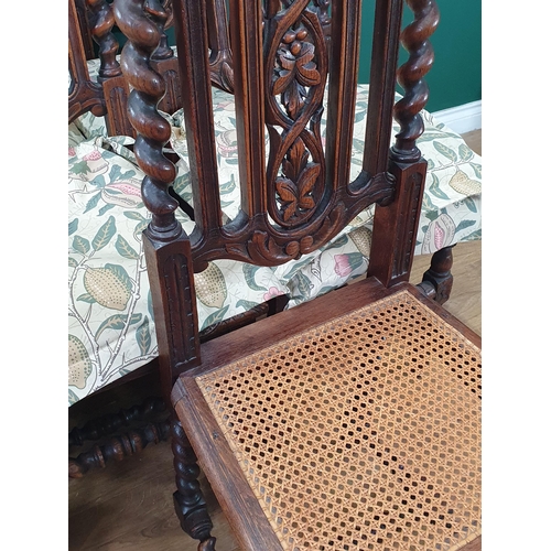 488 - A set of seven Victorian carved oak Dining Chairs including a large Carver with highback carved grif... 