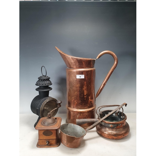 49 - A large copper Jug 20in H, a copper Pot with steel handles, a copper and steel Ladle, a Coffee Grind... 