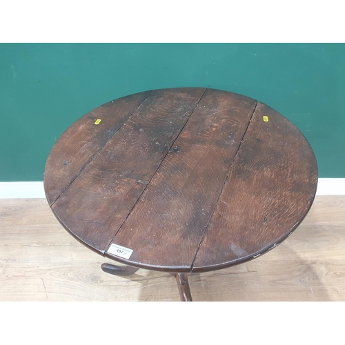 492 - An 18th Century oak Pillar Table on turned column and tripod base 2ft 5in H x 2ft 3in D (R4)