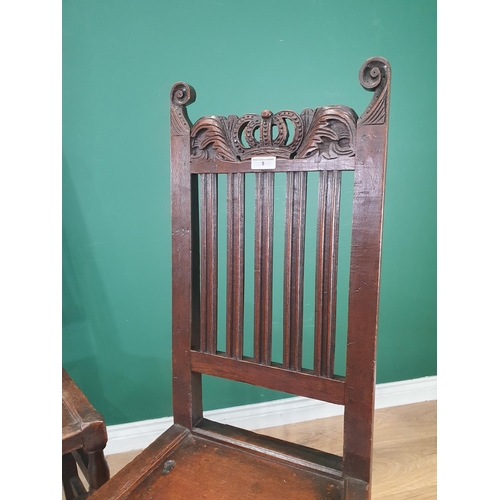 5 - A pair of 17th Century oak Hall Chairs with crown and leafage carved cresting rail and gouge moulded... 