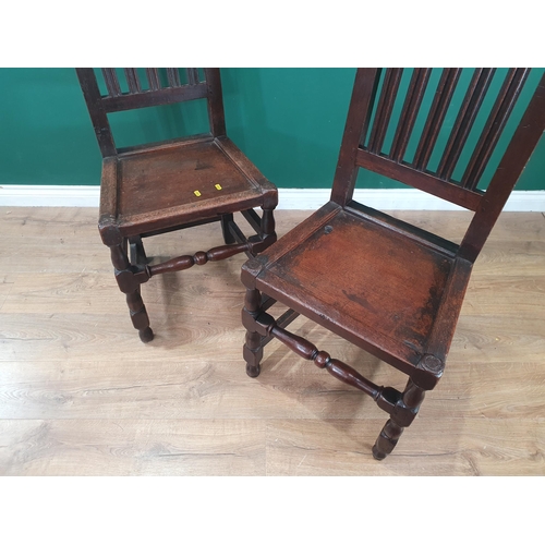 5 - A pair of 17th Century oak Hall Chairs with crown and leafage carved cresting rail and gouge moulded... 