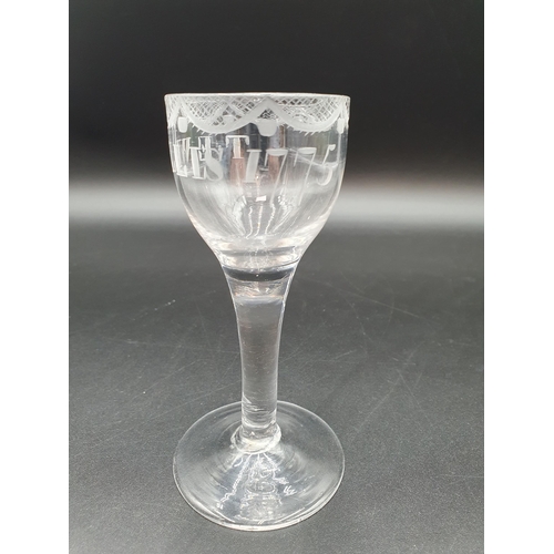 51 - A Georgian Wine Glass with trellis swag engraving and T.E. WILLIS 1775, 5in