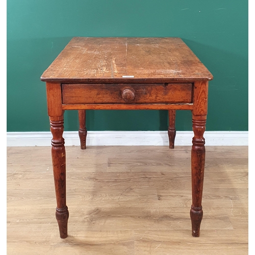 524 - A small pine Kitchen Table with single fitted drawer, raised on turned supports, 2ft 6