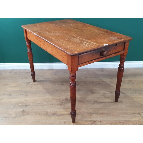 524 - A small pine Kitchen Table with single fitted drawer, raised on turned supports, 2ft 6