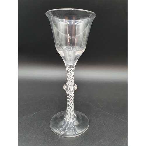 53 - A Wine Glass with funnel bowl on single knop stem with multiple opaque twist stem, 6 1/2in