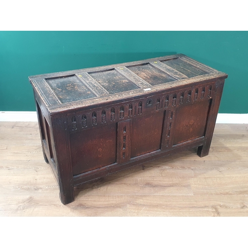 538 - A 17th Century oak Coffer with sunken four panel lid above nulled frieze 4ft 1in W x 2ft 3in H (R7)