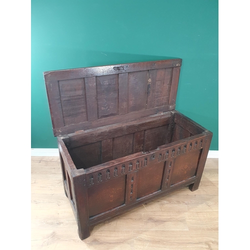 538 - A 17th Century oak Coffer with sunken four panel lid above nulled frieze 4ft 1in W x 2ft 3in H (R7)