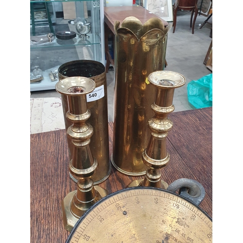 540 - Two engraved brass Shell Cases, a pair of brass Candlesticks, a set of Salter Scales, a 