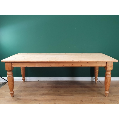 549 - A pine Kitchen Table on turned legs, 7ft x 3ft 4in (R7)