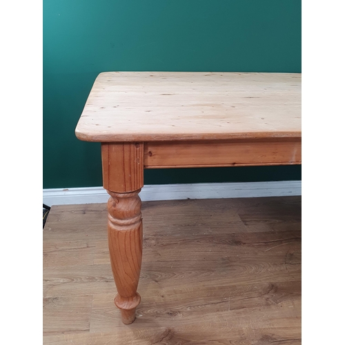 549 - A pine Kitchen Table on turned legs, 7ft x 3ft 4in (R7)