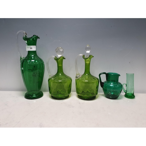 55 - A pair of green glass Flasks with clear fluted handles, a green glass Jug decorated lily of the vall... 