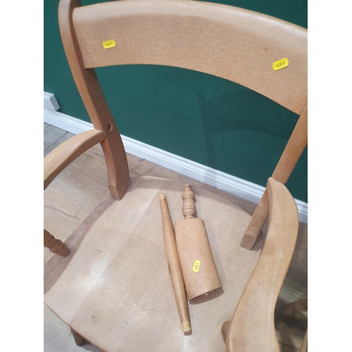 560 - A set of eight  beech Oxford style Kitchen Chairs with bar backs and solid seats, two carvers and si... 