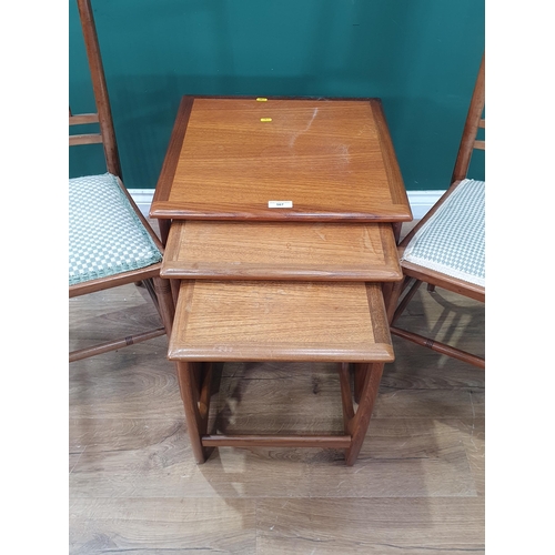 567 - A Mid Century Nest of three Tables (Largest 20